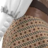 جمبسوت نسائي بزخارف بنية وأكمام بيضاء